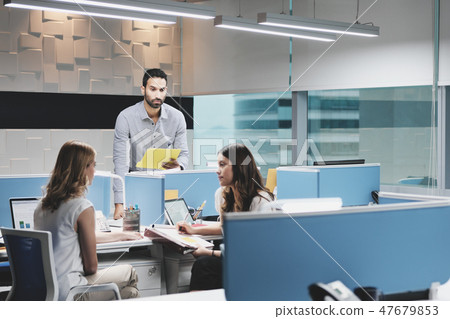Man At Work Ignored by Female Colleagues In Coworking Space 47679853
