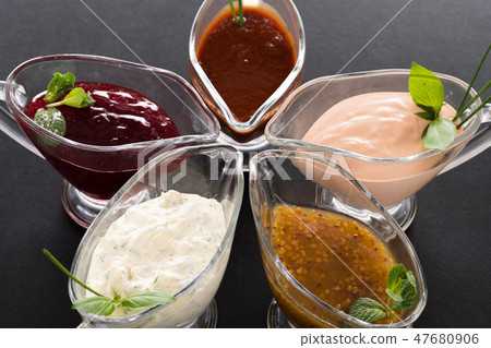 restaurant sauce glass gravy boat background 47680906