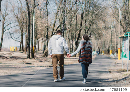 Happy couple in love hugging and sharing emotions Happy couple in love hugging and sharing emotions 47681199