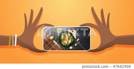 food blogger taking mobile photo of fresh vegetable salad with chicken and sauce top angle view 47682408