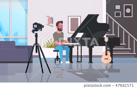 guy musical blogger recording video on camera man playing classical piano music blog concept modern 47682571