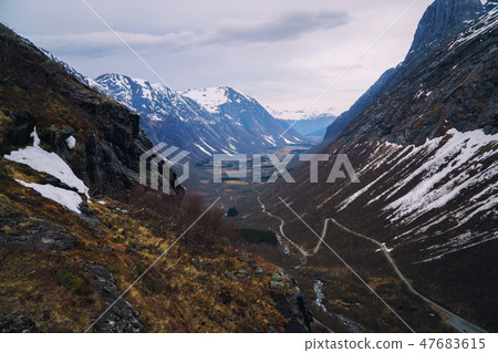 Trolls road in Norway - mountain route of Trollstigen, top view. Spring season. Trolls road in Norway - mountain route of Trollstigen, top view. Spring season. 47683615