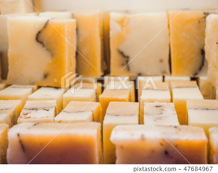 Bars of soap on a shop window. Orange soap with natural cedar oil and herbal ingredients. Handmade Bars of soap on a shop window. Orange soap with natural cedar oil and herbal ingredients. Handmade 47684967