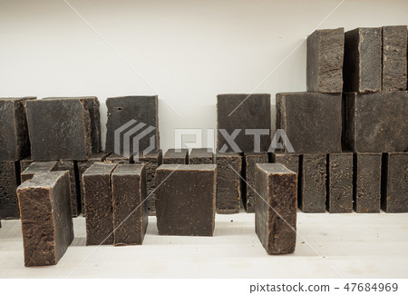 Bars of soap on a shop window. Tar soap with natural cedar oil, turpentine and herbal ingredients Bars of soap on a shop window. Tar soap with natural cedar oil, turpentine and herbal ingredients 47684969