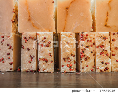 Bars of soap on a shop window. Fruit soap with natural cedar oil and herbal ingredients. Handmade Bars of soap on a shop window. Fruit soap with natural cedar oil and herbal ingredients. Handmade 47685036