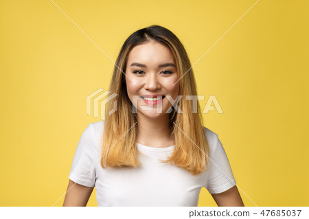 Close up of young Asian beautiful woman with smiley face Close up of young Asian beautiful woman with smiley face 47685037