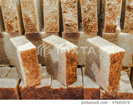Bars of soap on a shop window. Cinnamon soap with natural cedar oil and herbal ingredients. Handmade Bars of soap on a shop window. Cinnamon soap with natural cedar oil and herbal ingredients. Handmade 47685078