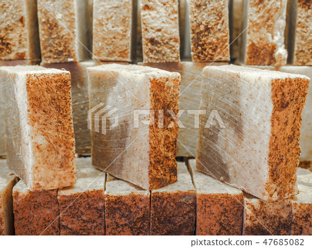 Bars of soap on a shop window. Cinnamon soap with natural cedar oil and herbal ingredients. Handmade Bars of soap on a shop window. Cinnamon soap with natural cedar oil and herbal ingredients. Handmade 47685082