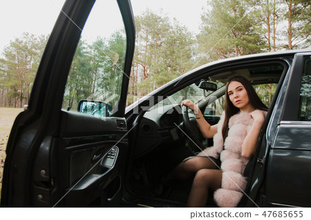 Portrait of a very beautiful girl in a forest Portrait of a very beautiful girl in a forest 47685655