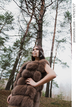 Portrait of a very beautiful girl in a forest 47685727