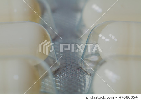 Close-up drugs in blisters, macro photography Close-up drugs in blisters, macro photography 47686054