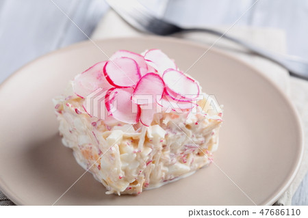 Spring salad with radish, egg, and sour cream 47686110