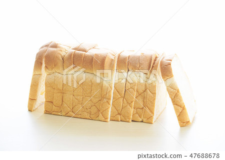 Homemade slide bread on the wooden table. Homemade slide bread on the wooden table. 47688678