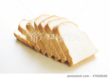 Homemade slide bread on the wooden table. Homemade slide bread on the wooden table. 47688680