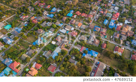 neighborhood with residential houses and driveways 47689152