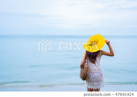 Women travel at the beach on Summer Vacation 47691424