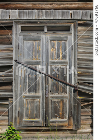 Door in old wooden church Door in old wooden church 47691766