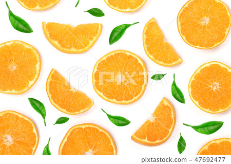 Slices of orange or tangerine with leaves isolated on white background. Flat lay, top view. Fruit Slices of orange or tangerine with leaves isolated on white background. Flat lay, top view. Fruit 47692477
