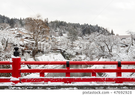 Nakabashi Bridge and snow fall at Takayama , Japan 47692928