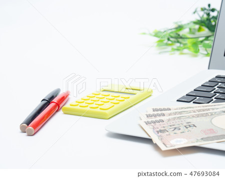 Computer banknote calculator pen business image Computer banknote calculator pen business image 47693084