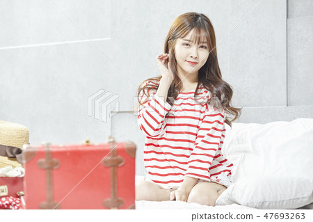 Travel, vacation, relaxation, young woman 47693263