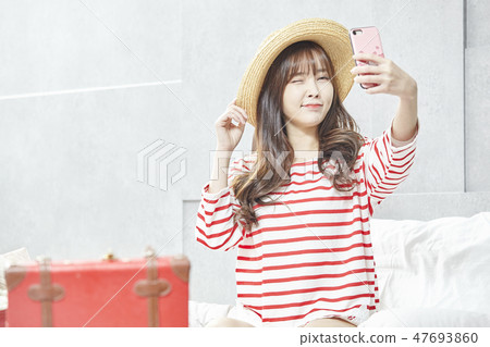 Travel, vacation, relaxation, young woman 47693860