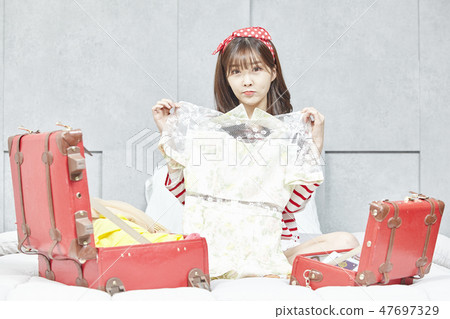 Travel, vacation, relaxation, young woman 47697329