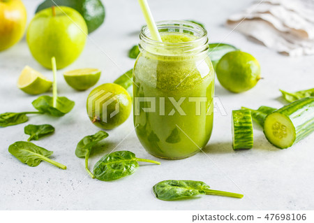 Green healthy smoothie (juice) in the jar. 47698106