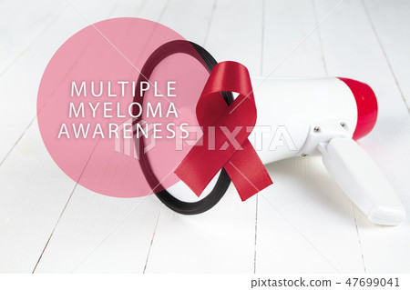 Burgundy ribbon. Multiple myeloma awareness. Healthcare and medicine concept. Burgundy ribbon. Multiple myeloma awareness. Healthcare and medicine concept. 47699041
