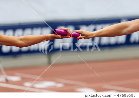 relay race racing hands women runners relay race racing hands women runners 47699595