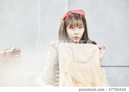 Travel, vacation, relaxation, young woman 47700438