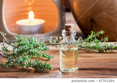 A bottle of thyme essential oil A bottle of thyme essential oil 47701264