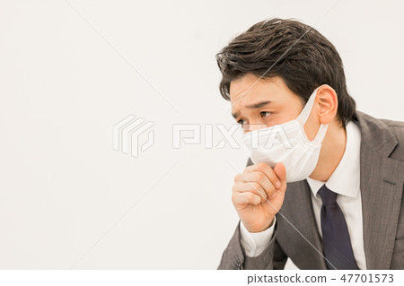Businessman coughing Businessman coughing 47701573