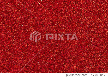 Background filled with shiny red glitter.  47701847