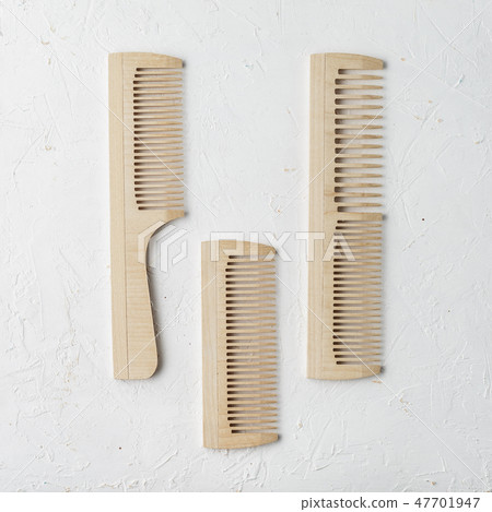 Wooden hair or beard combs on white background 47701947