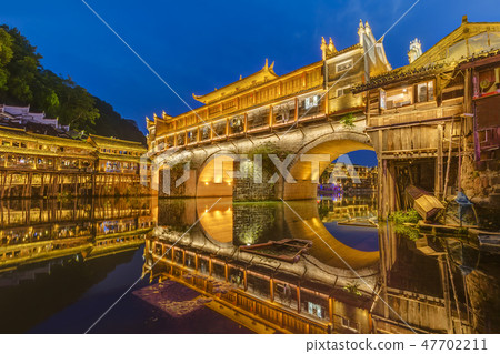 Ancient town Fenghuang at sunset in Hunan China 47702211