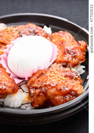 Tasty delicious chicken on rice Tasty delicious chicken on rice 47702632