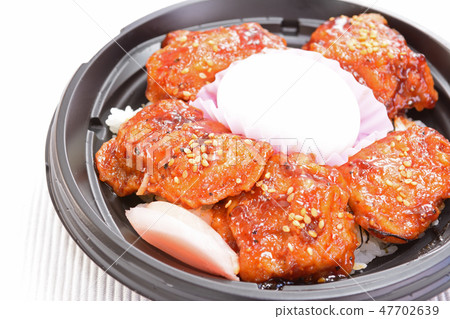 Tasty delicious chicken on rice Tasty delicious chicken on rice 47702639