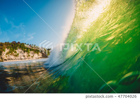 Big green wave in ocean. Breaking wave in Bali 47704026