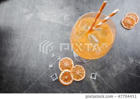 Glass of aperol soda cocktail 47704451