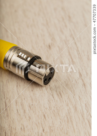 Female XLR connector for microphone connection . Female XLR connector for microphone connection . 47707339
