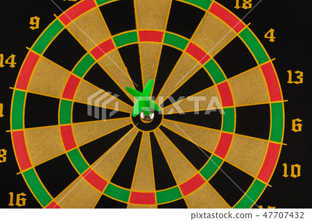 The game of darts, darts on the target. The game of darts, darts on the target. 47707432