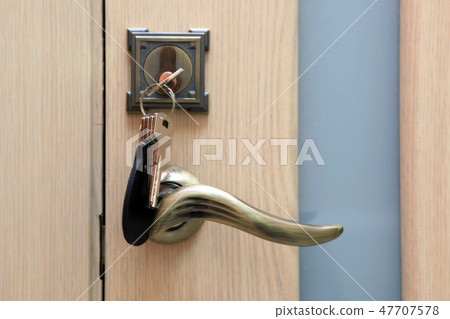 Keys left in a keyhole Keys left in a keyhole 47707578