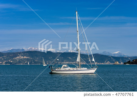 Sailboats in the Gulf of La Spezia in winter Italy 47707761