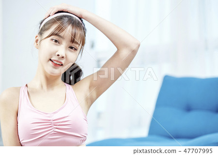 Stretching, exercise, fitness, yoga, pilates, young woman Stretching, exercise, fitness, yoga, pilates, young woman 47707995