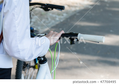 Mountain biking down hill descending fast on 47708495