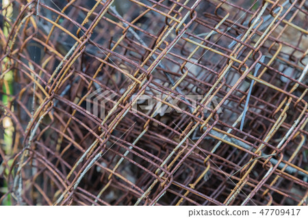 Iron mesh for fence with rust and paint. 47709417