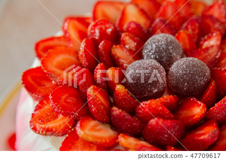 Bright beautiful mouth-watering strawberry cake 47709617