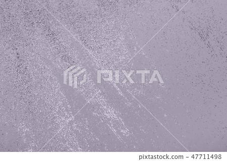 Festive pastel gray background with metallic glitter. 47711498