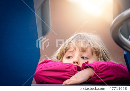 Cute concerned little girl Cute concerned little girl 47711638